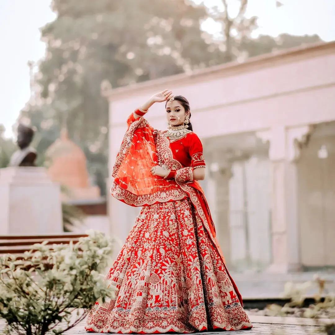 Red Zardozi Bridal Lehenga - Elephant Motif Embroidery Red Bridal Lehenga with Zardozi Work and Traditional Elephant Motif Embroidery
